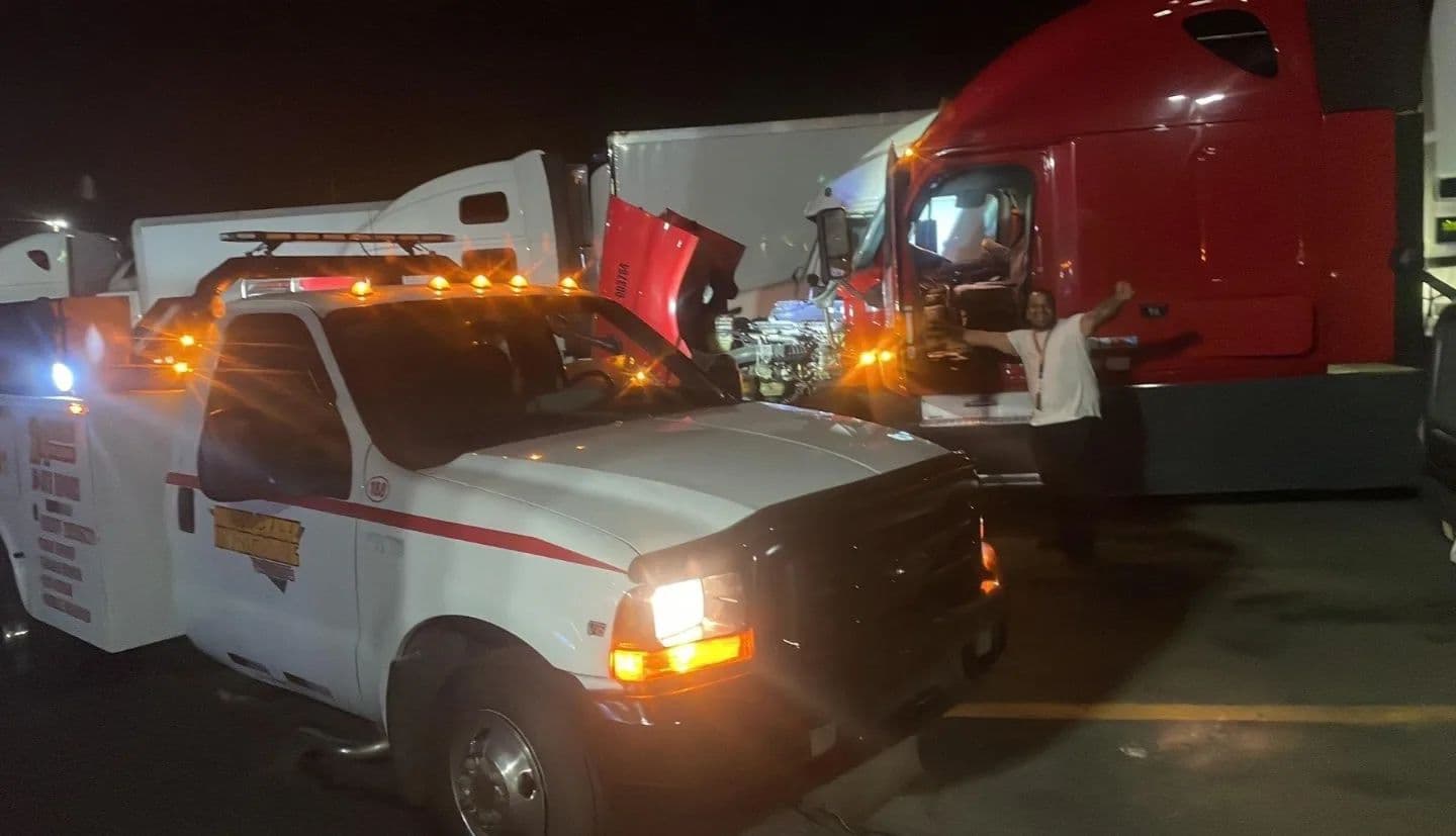 IFS night roadside service on a Freightliner Cascadia